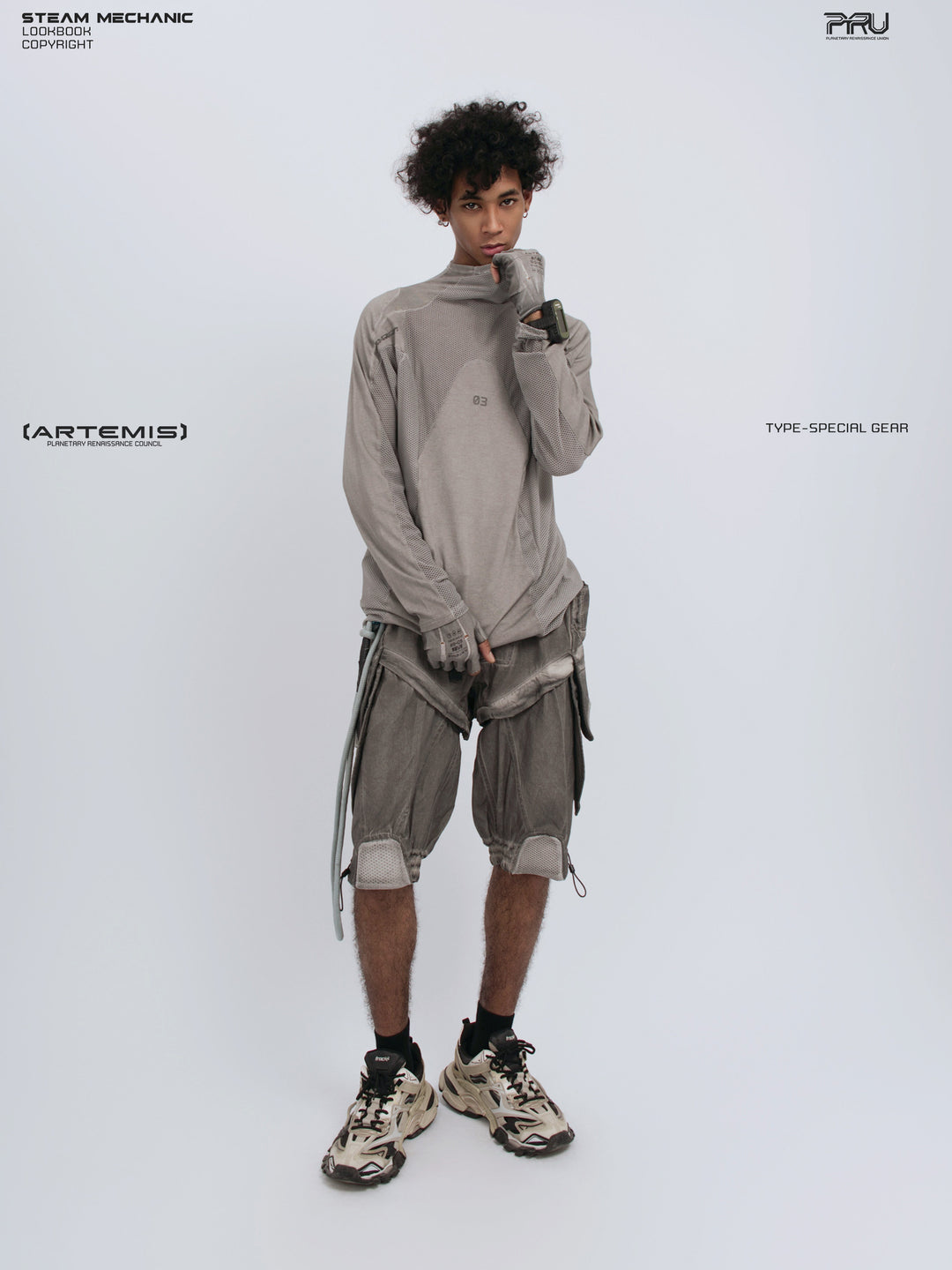 STARCORE mesh-panel long-sleeve top in dusk cloud gray — full-length front modeled view with collar lifted