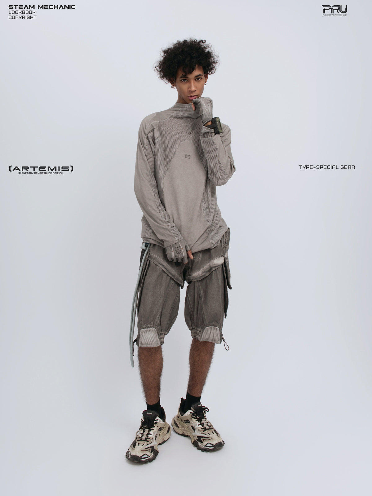 STARCORE mesh-panel long-sleeve top in dusk cloud gray — full-length front modeled view with collar lifted