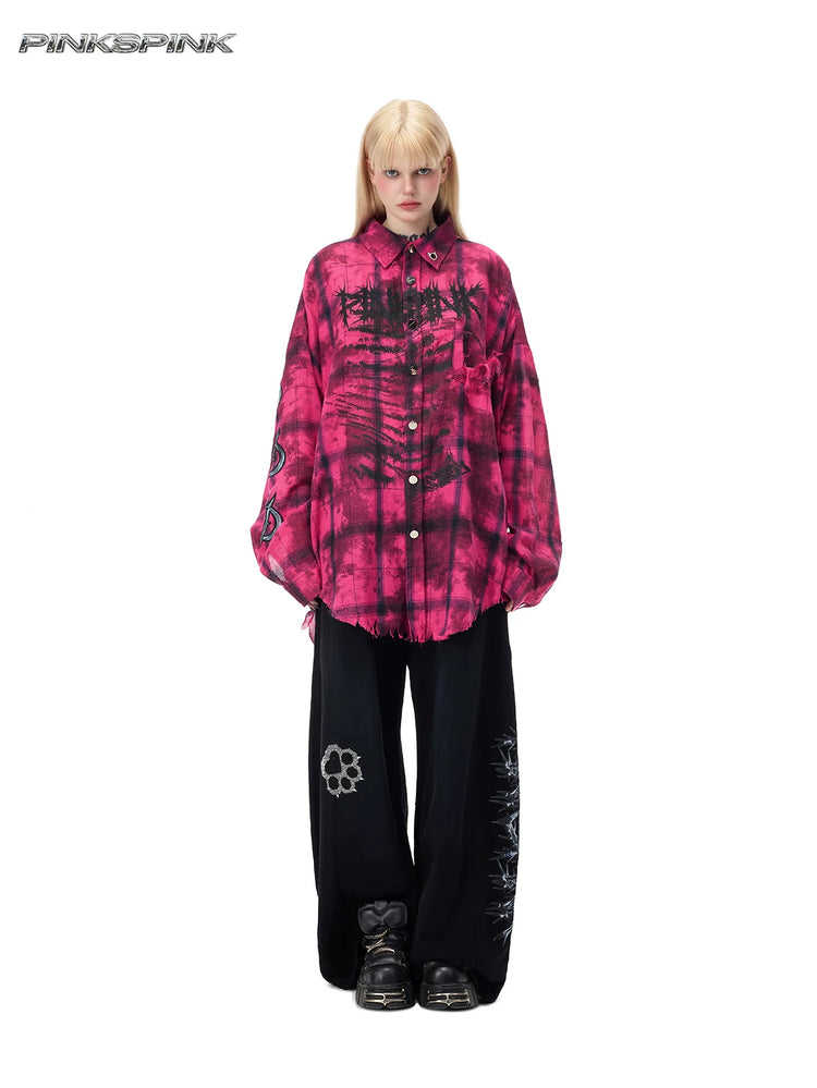 PINKSPINK ELECTRIC MOON distressed oversized plaid shirt in pink and black plaid — full-length front modeled view over wide-leg trousers
