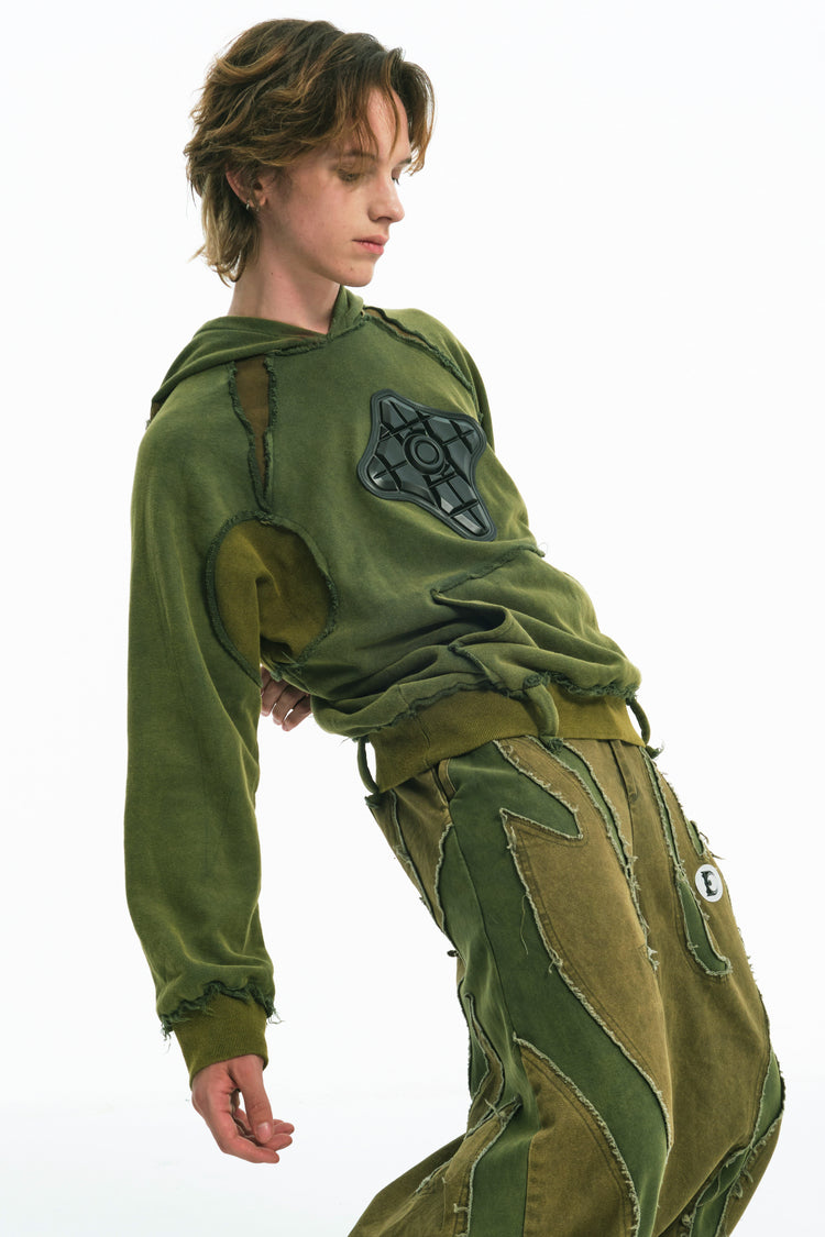 EMBRYO GREEN GUARD distressed armor hoodie — material and hardware detail