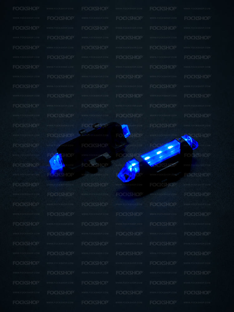 FOCKSHOP TRAIN L rechargeable costume light pair — blue lights showing the illuminated front and mounting back
