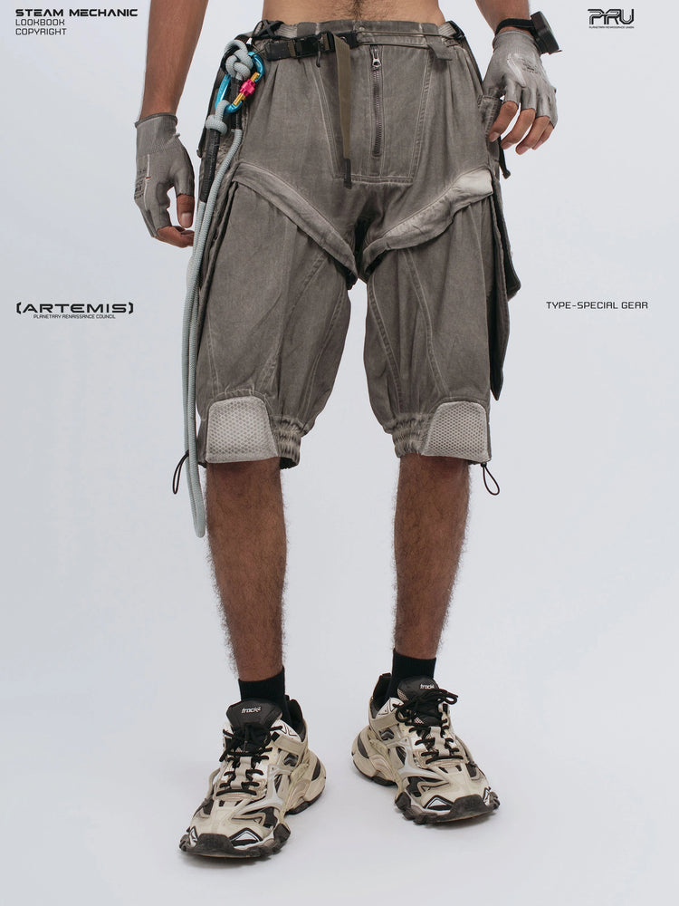 ARTEMIS xirang brown detachable technical shorts — angled front view with left hand in pocket