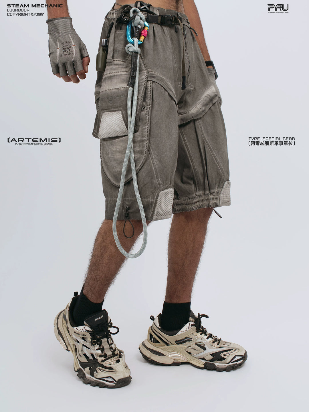 ARTEMIS xirang brown detachable technical shorts — rear modeled view
