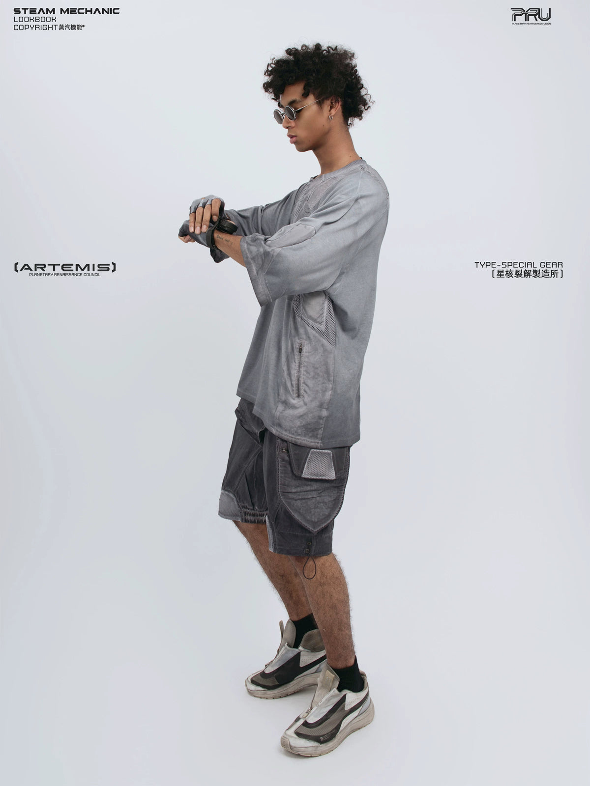 STARCORE stellar blue distressed mesh tee — material and silhouette detail