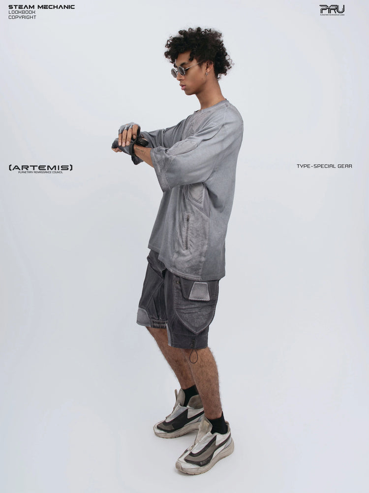 STARCORE stellar blue distressed mesh tee — full-length side view adjusting a glove