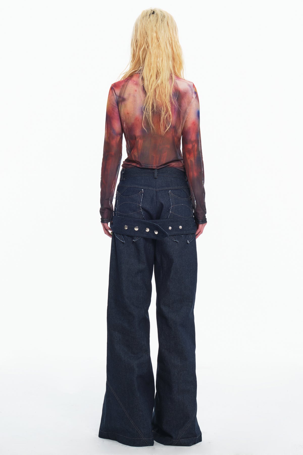 EMBRYO BONE FRAME low-rise flare pants & waist panel — rear modeled view