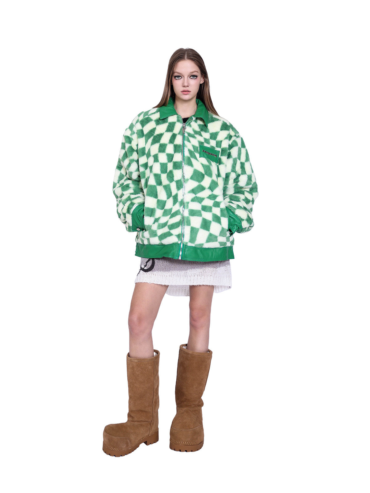 PINKSPINK WARPED checkerboard padded faux-fur jacket — green checkerboard jacket — front view with hands in pockets