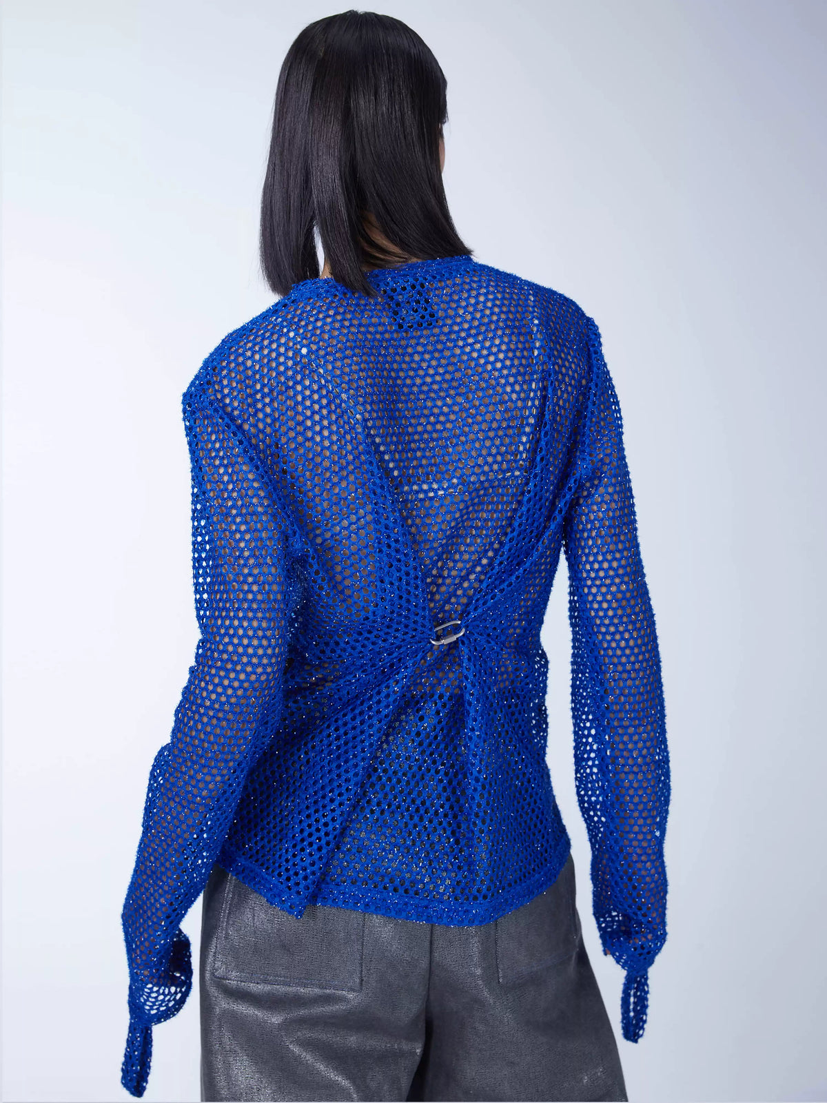 EMBRYO BLUE VOID cutout mesh finger-sleeve top — back modeled view