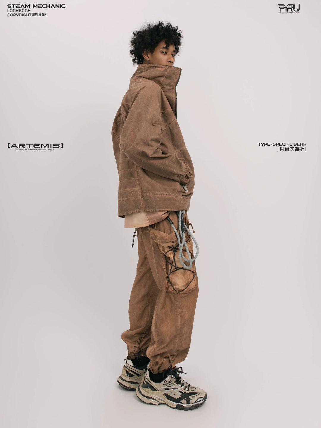 ARTEMIS soft dawn orange tuck-paneled technical jacket — side modeled view