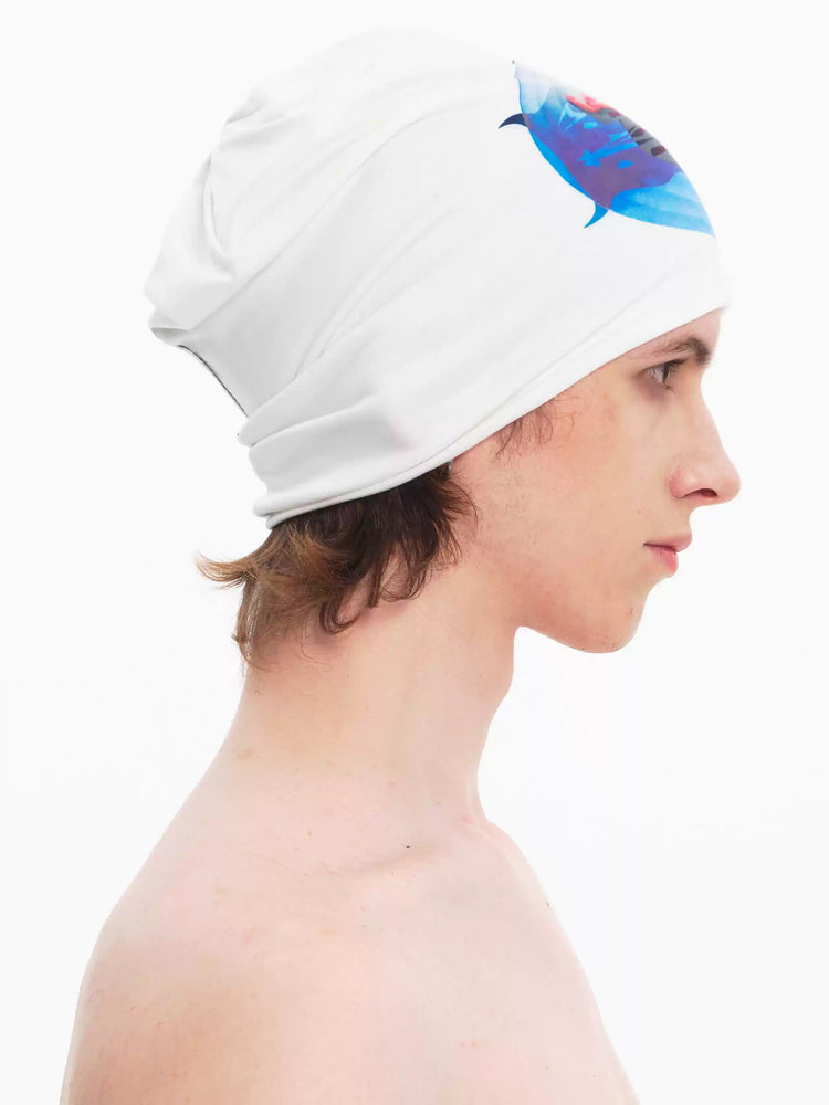 EMBRYO PLAN white graphic slouch beanie — side modeled view