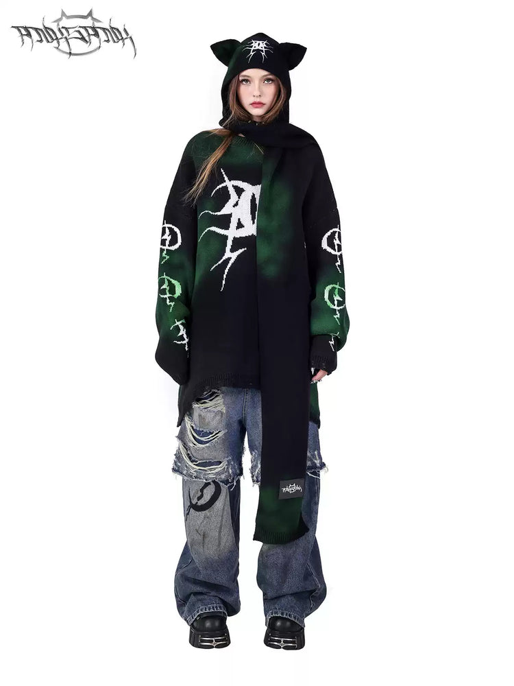 PINKSPINK ELECTRIC MOON graffiti color-block sweater — close modeled view highlighting the construction