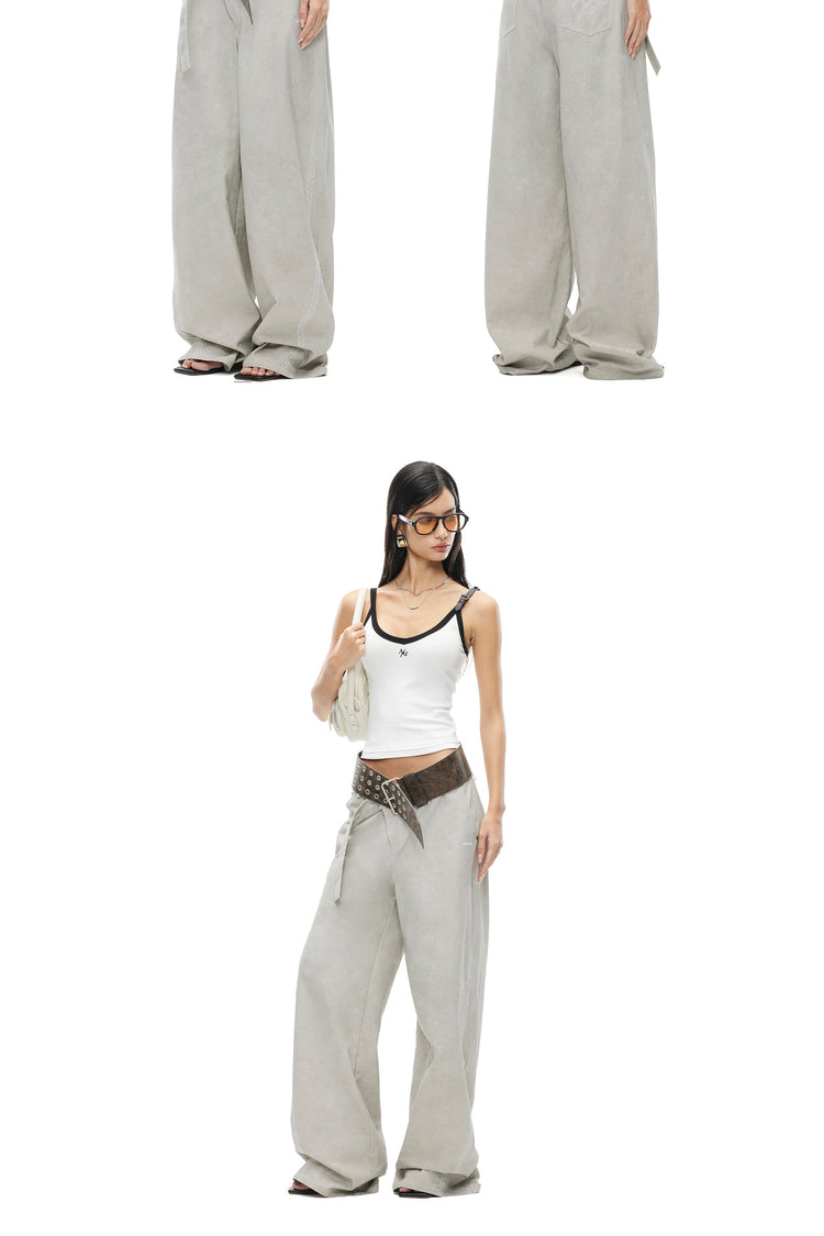 NAWS MONA leather-belt camisole — product detail view showing texture and hardware
