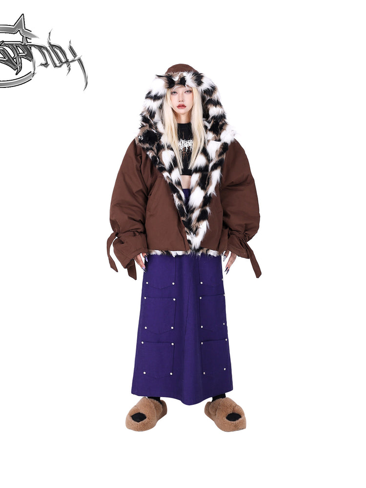PINKSPINK DNA reconstructed multi-pocket denim maxi skirt — front modeled view styled with a hood-up padded jacket