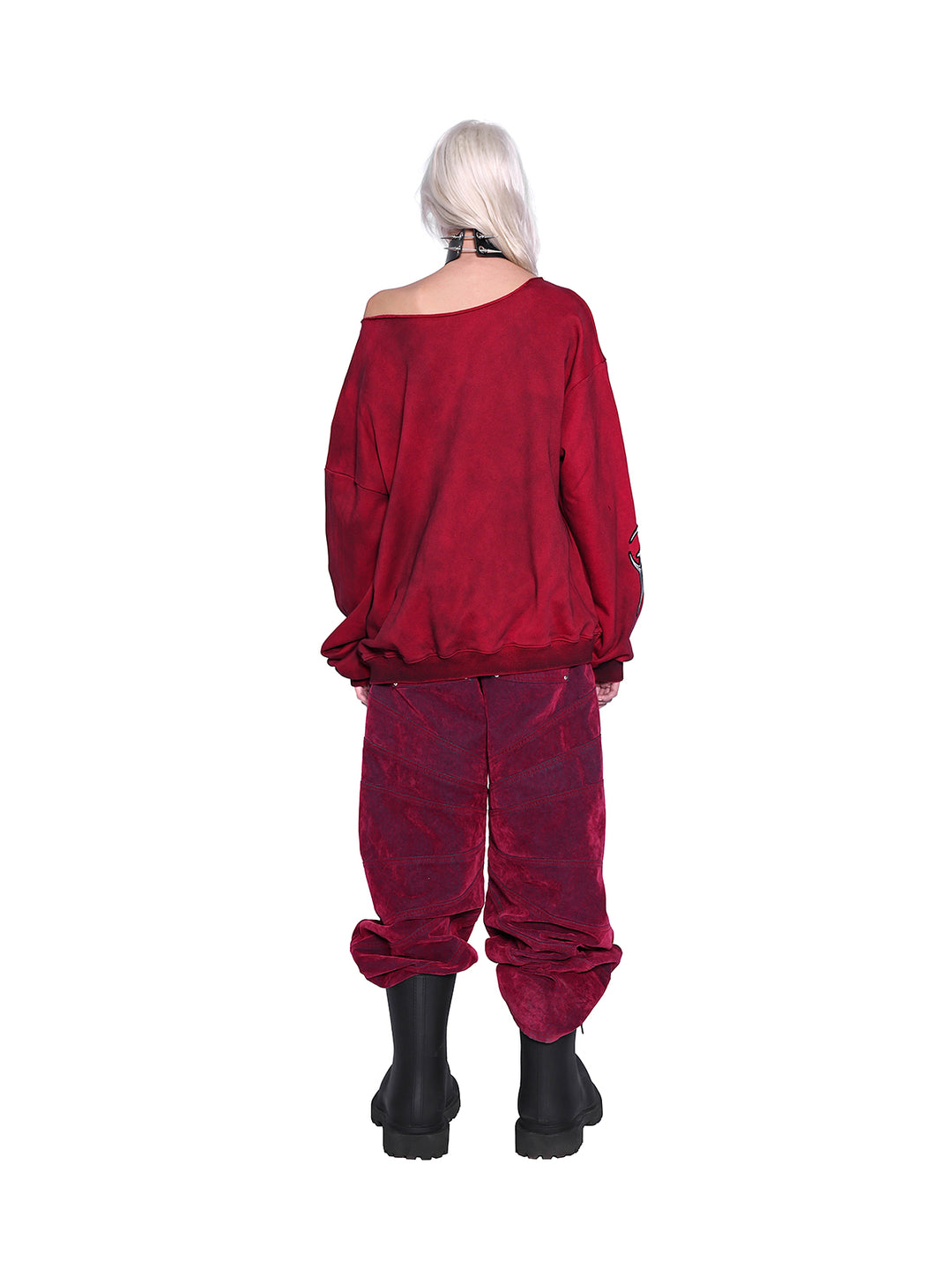 PINKSPINK ELECTRIC MOON off-shoulder sweatshirt in RED — rear full-body view styled with red trousers.