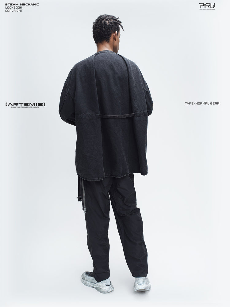 GAIA curved-blade technical pants in black — full-length rear styling view with a matching jacket
