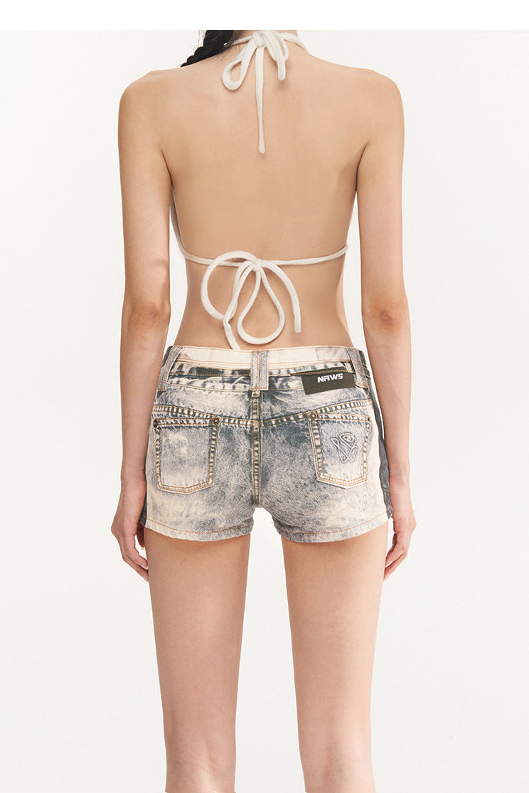 NAWS PRINTLAB multi-pocket denim shorts — modeled detail view of the garment construction