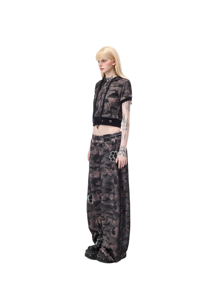 PINKSPINK CATPAW rhinestone curved-leg sweatpants in gray-brown camouflage — full-length side modeled view showing the thorn graphic