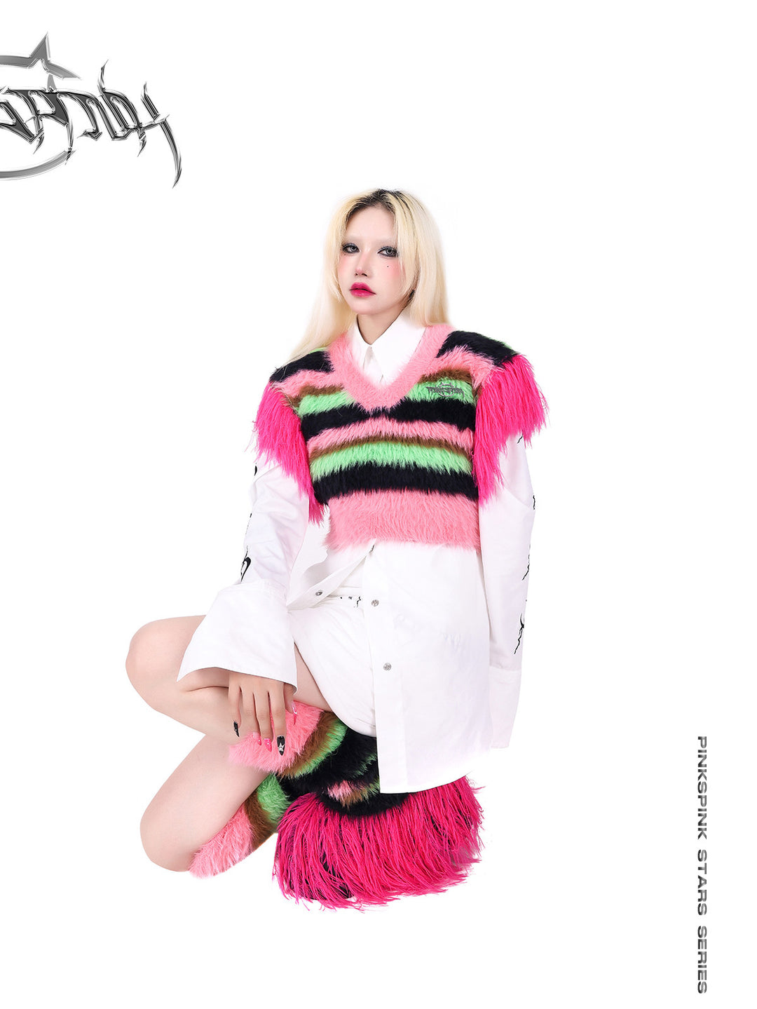 PINKSPINK FUTURE COLOR striped knit leg warmers — modeled detail view of the garment construction