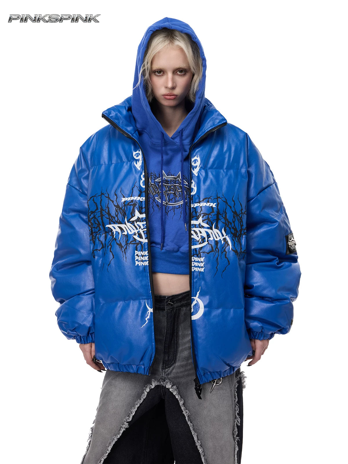 PINKSPINK MOTORBLOC padded faux-leather jacket — Klein blue front modeled view layered over a separate hoodie