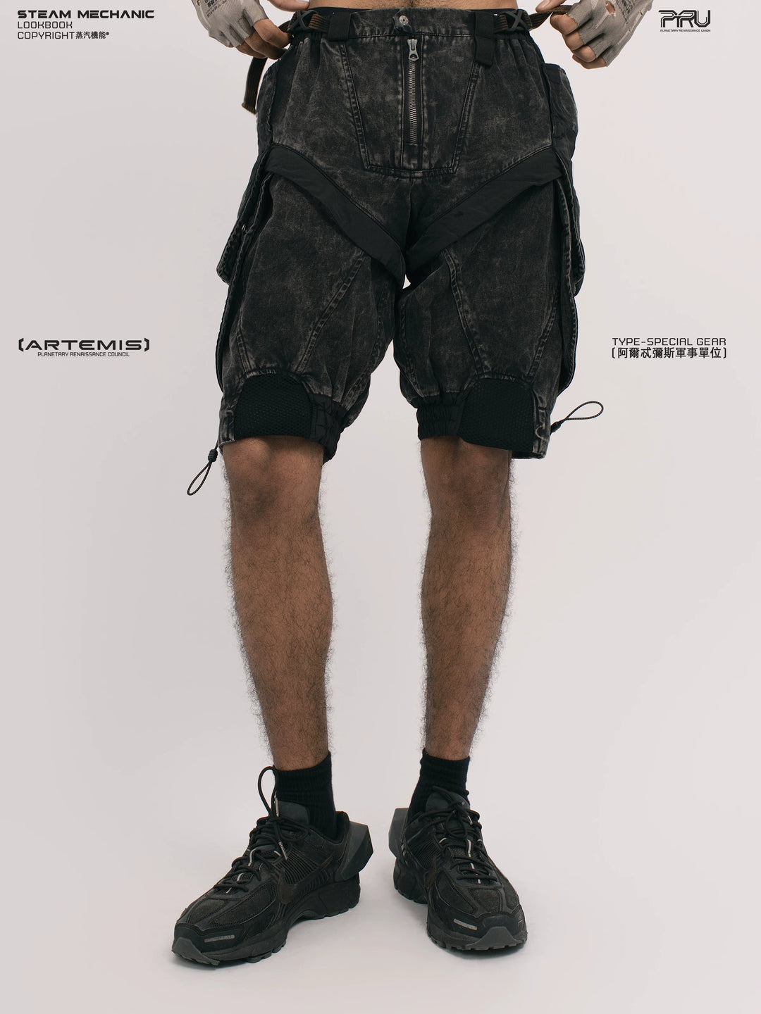 ARTEMIS blackbird black detachable technical shorts — front modeled product view