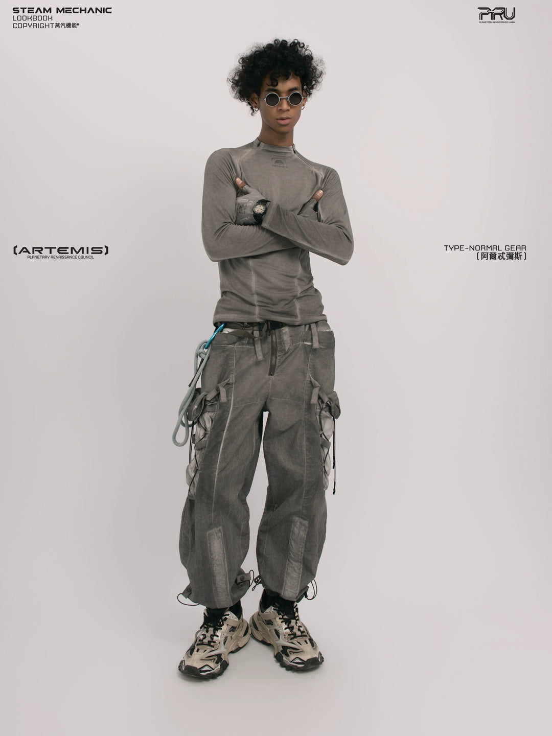 TWIN STAR meteor gray stretch riding base-layer top — side modeled view