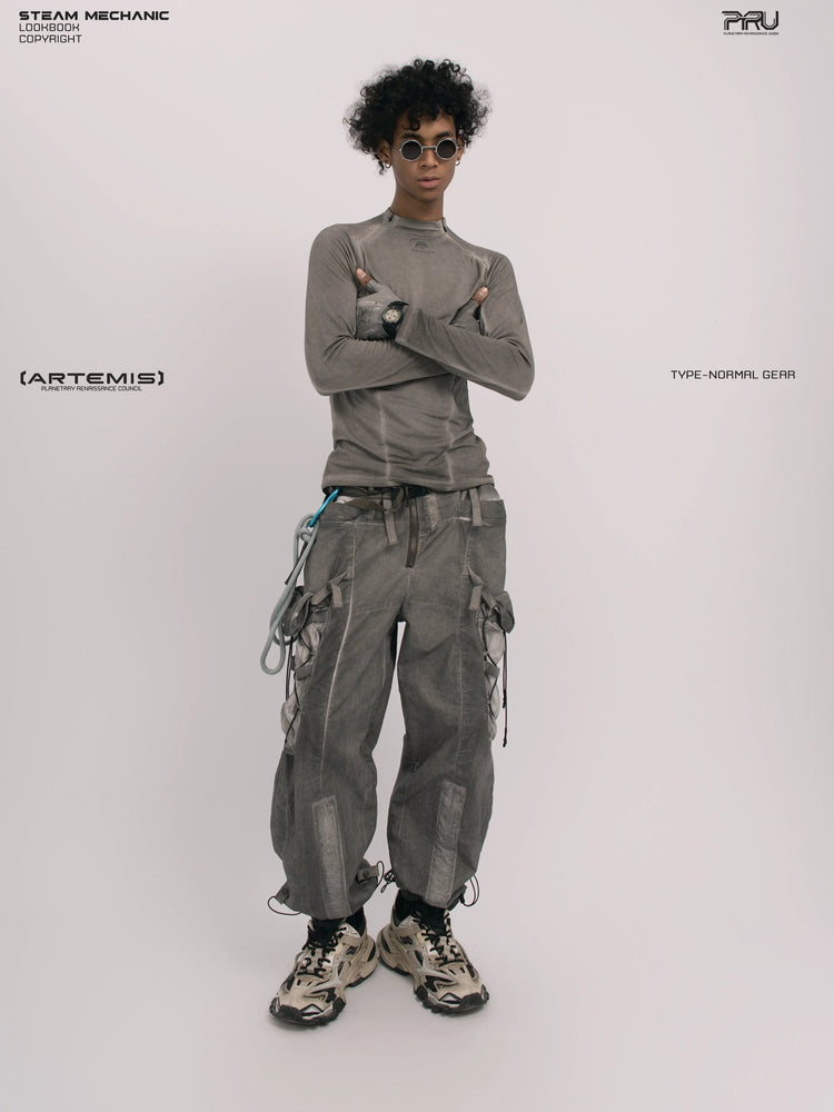 TWIN STAR meteor gray stretch riding base-layer top — full-length front view with arms folded