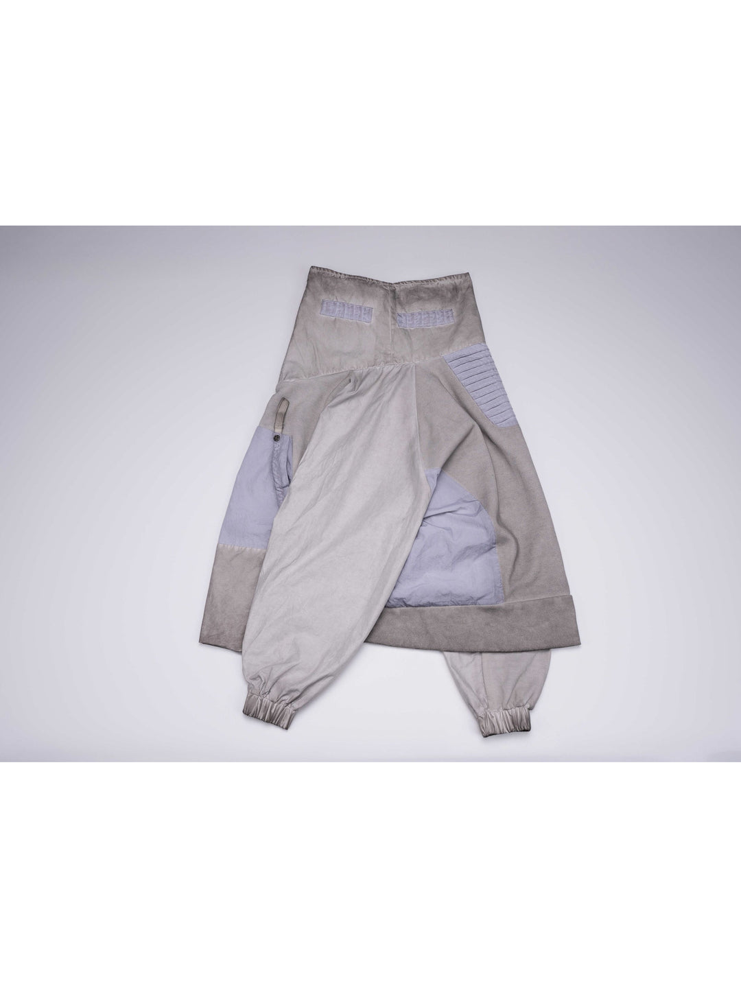 PIONEER eris white detachable-pocket utility hoodie — side flat-lay view showing raglan sleeve construction and contrast side pocket