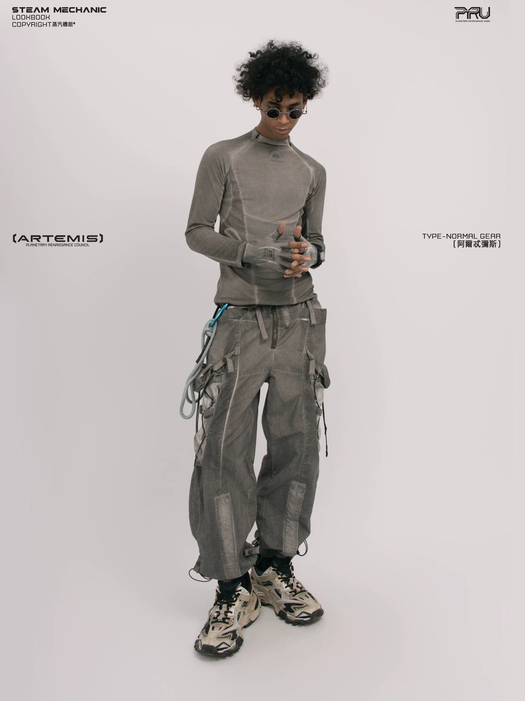 TWIN STAR meteor gray stretch riding base-layer top — rear modeled view