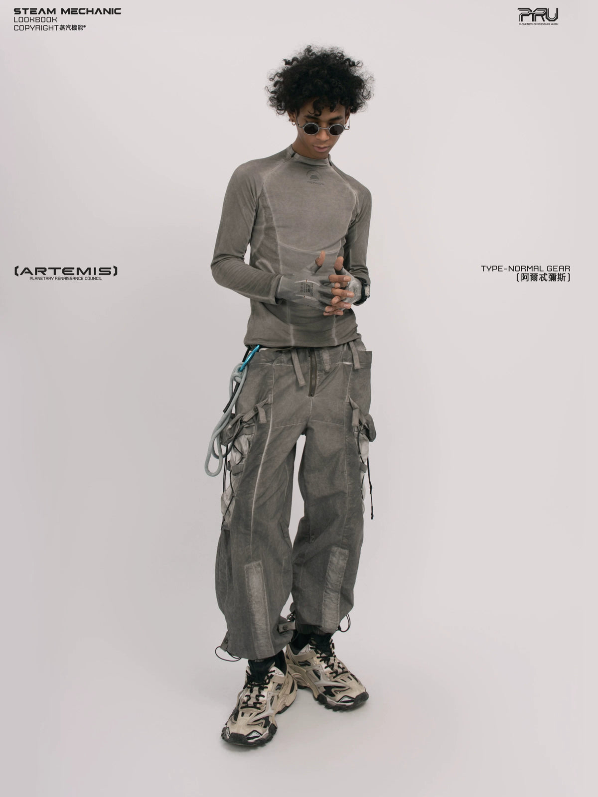 TWIN STAR meteor gray stretch riding base-layer top — rear modeled view