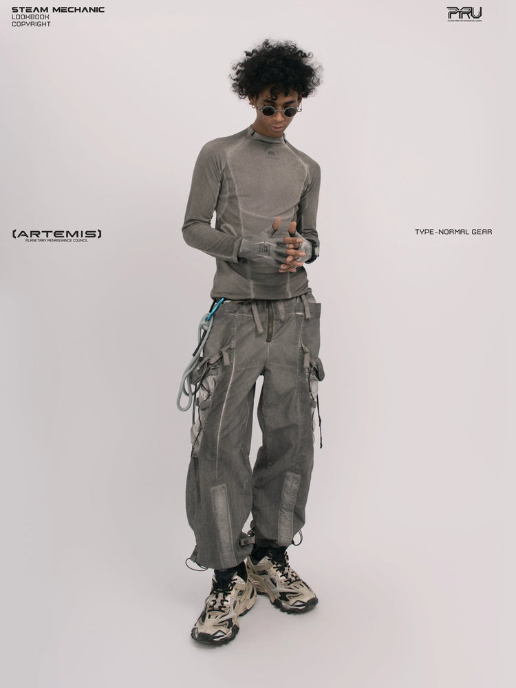 TWIN STAR meteor gray stretch riding base-layer top — full-length front view with hands clasped