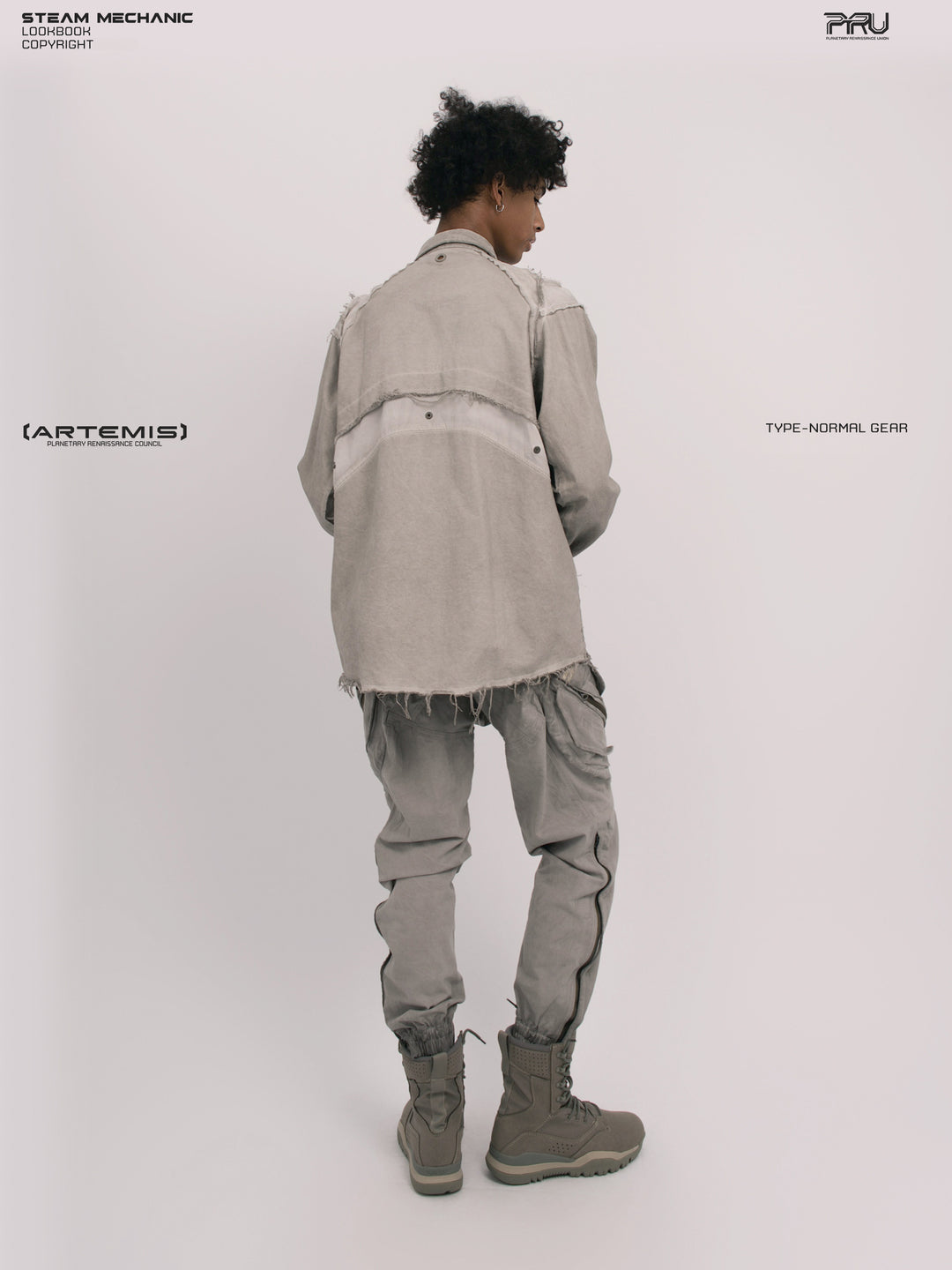CHAOS ERA raw-edge technical shirt in nightfall gray — opposite rear three-quarter modeled view
