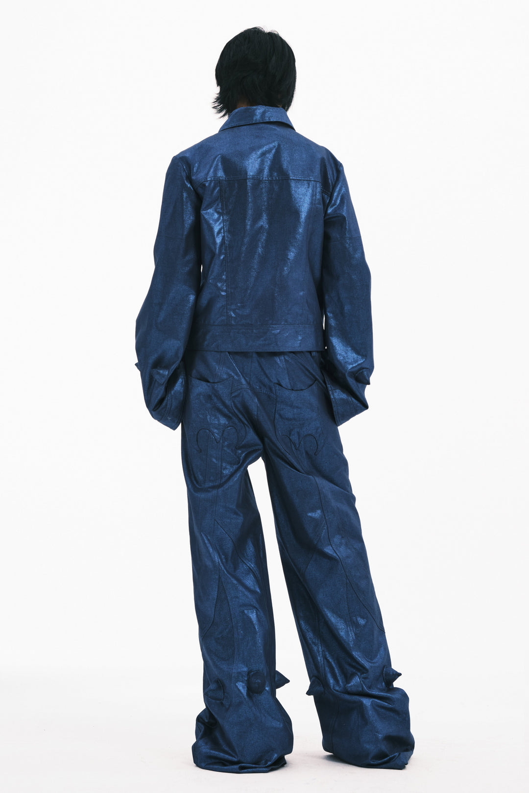 EMBRYO BLUE SPIKE metallic bell-sleeve jacket — blue full-length rear modeled view showing pointed bell cuffs