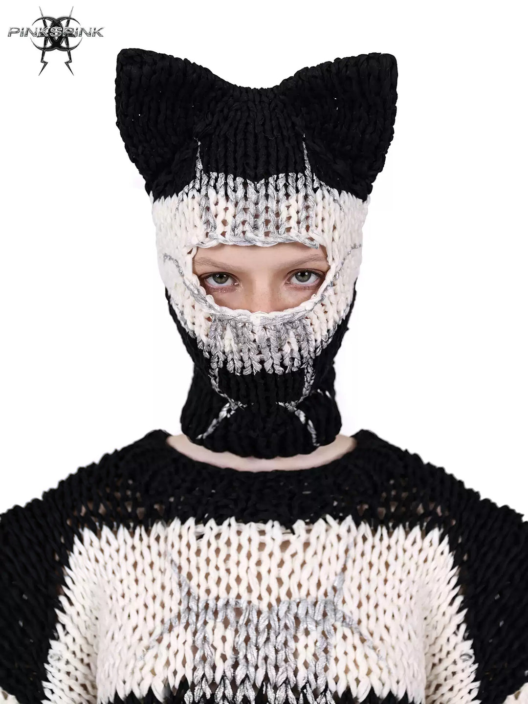 PINKSPINK MIRROR striped cat-ear knit balaclava in black white stripes — front modeled close-up showing cat ears and the metallic face-opening motif