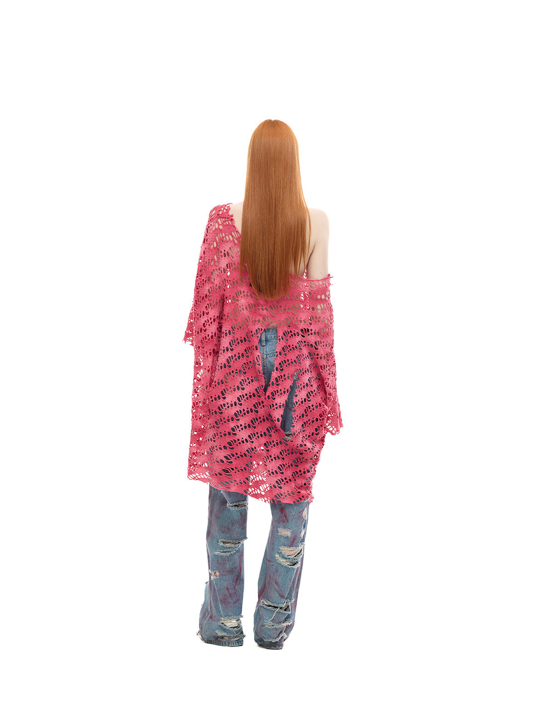 PINKSPINK ELECTRIC MOON distressed open-knit oversized tee in pink — full-length back modeled view over faded jeans