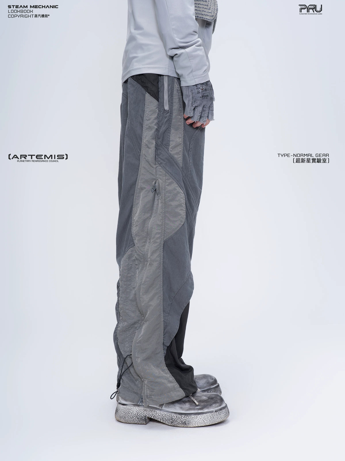 SUPERNOVA alloy gray metallic nylon technical pants — full-length styled view