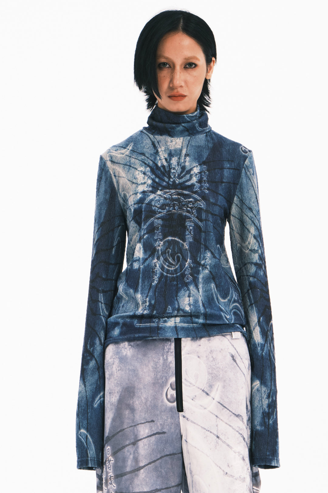 EMBRYO ANCIENT CODE textured mock-neck top — full-length modeled styling view