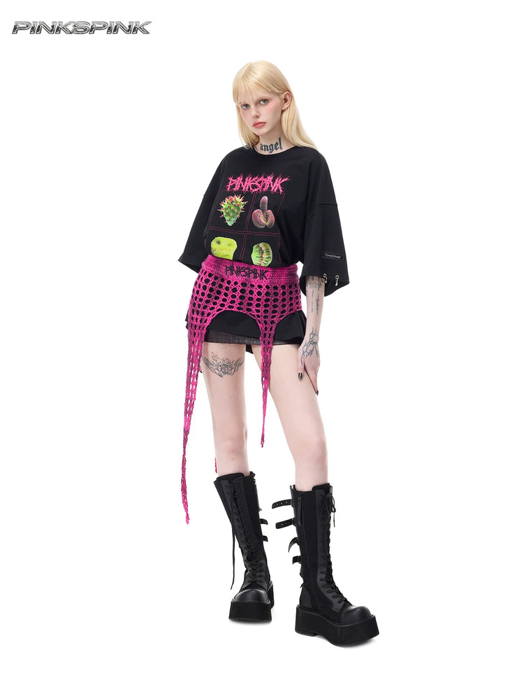 PINKSPINK PLANT PUNK oversized graphic tee in black — angled full-length front modeled view with a separate pink open-knit layer