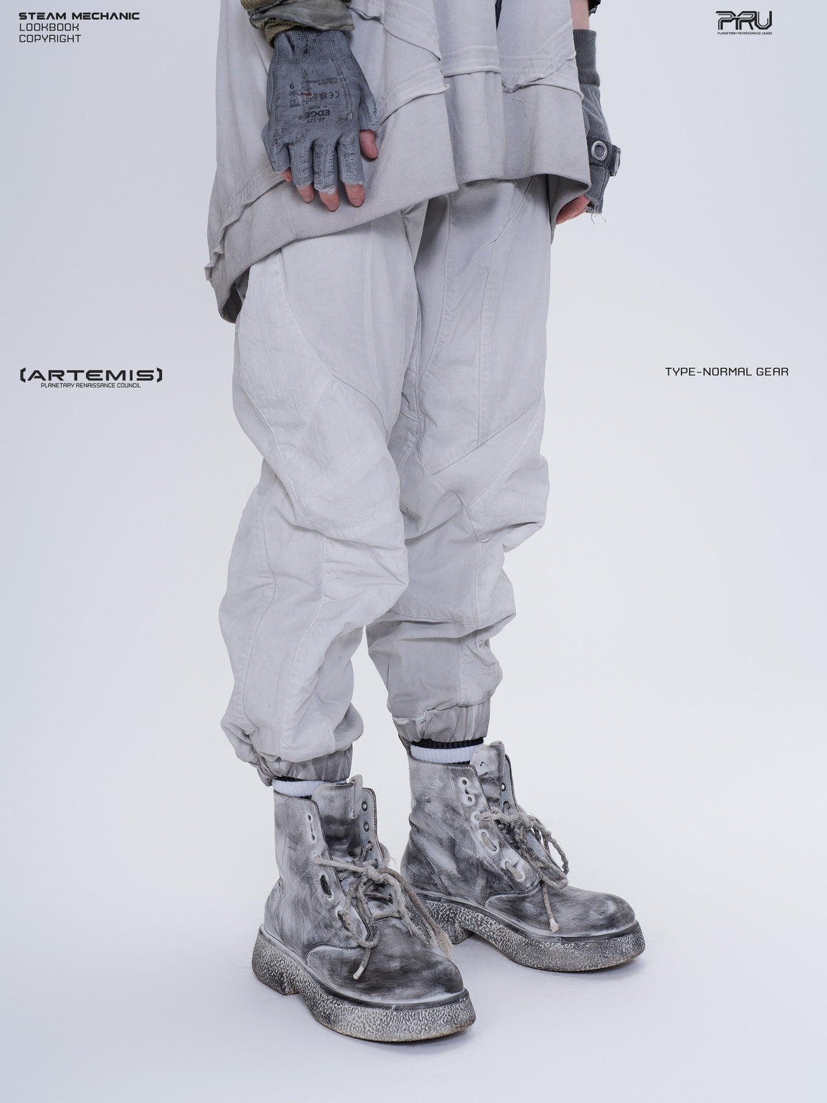 AEGIS eris white cropped moto riding pants — opposite front three-quarter close-up showing the curved knee panels