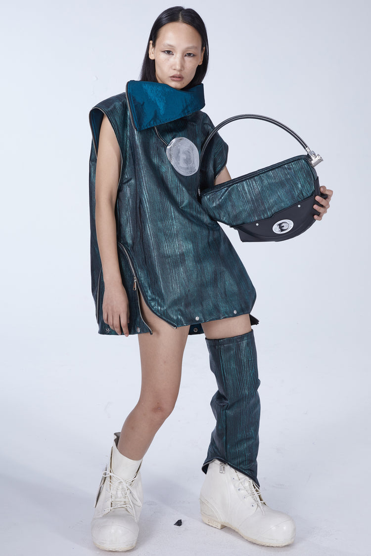 EMBRYO TIRELINE embossed underarm bag — rear modeled view