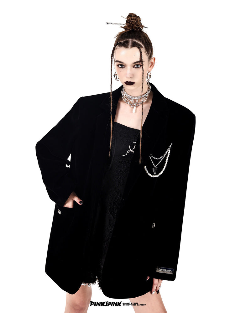 PINKSPINK DEAN pearl-chain velvet blazer — black three-quarter modeled view with hands in pockets