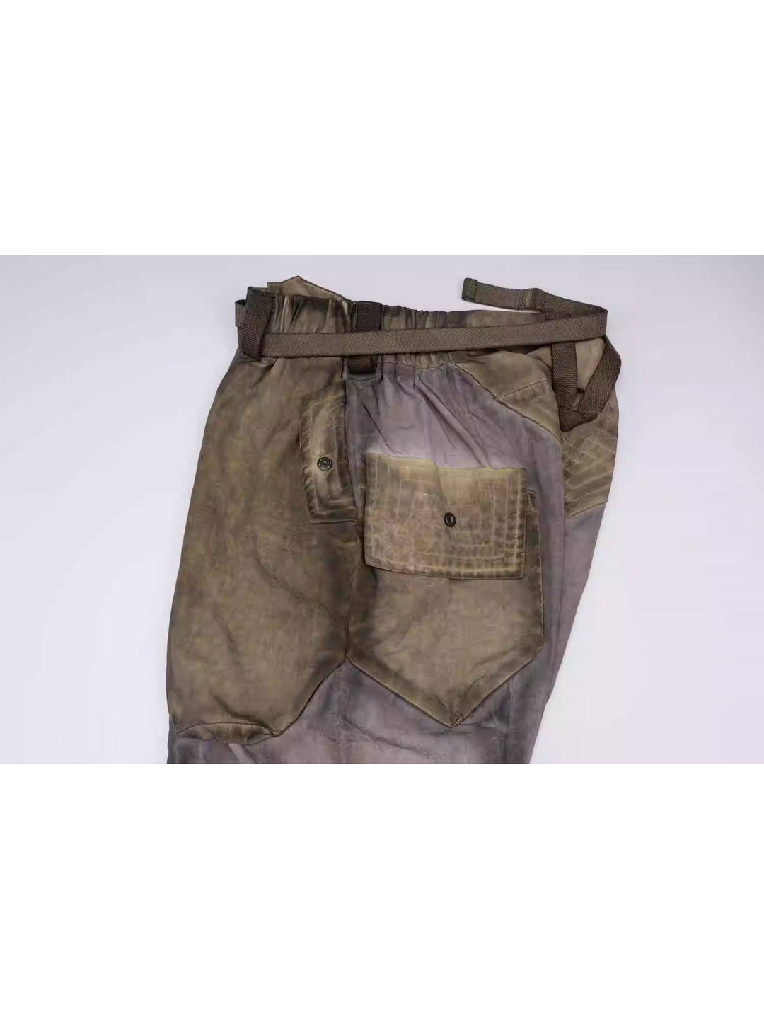 STARCORE mercury brown engineer utility pants — folded flat lay showing front and rear pocket construction