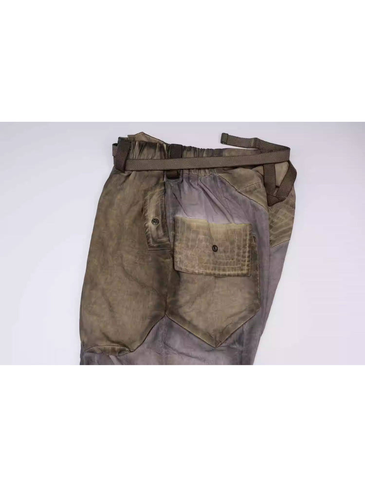 STARCORE mercury brown engineer utility pants — folded flat lay showing front and rear pocket construction