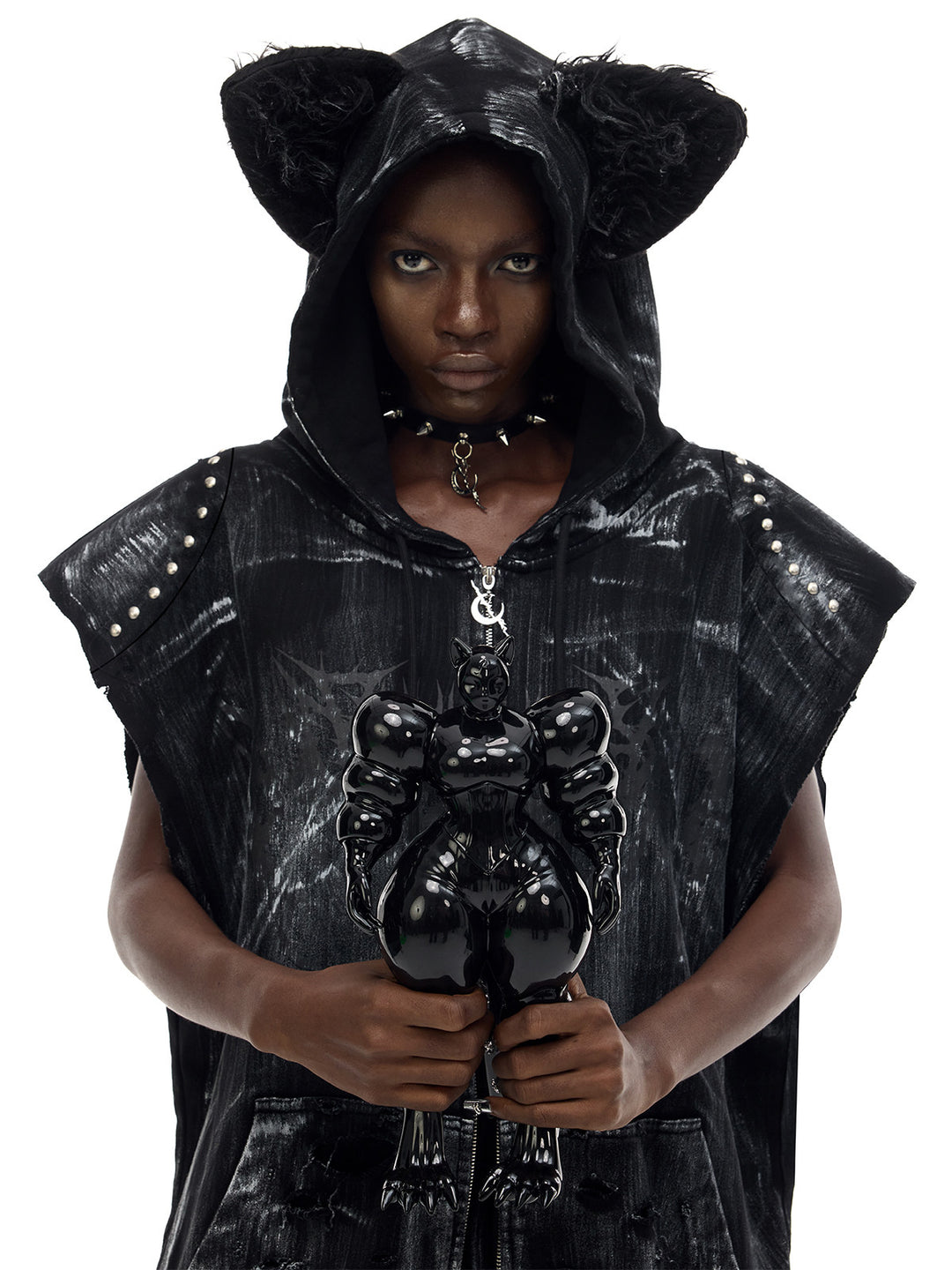 PINKSPINK ELECTRIC MOON studded cat-ear vest in black — hood-up modeled close-up showing the textured cat ears and studded shoulders