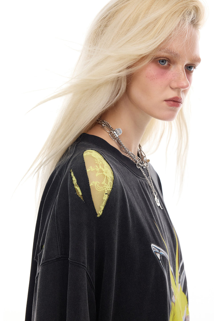 PINKSPINK HORNED FROG distressed graphic tee in black — close-up of the distressed shoulder and washed cotton texture