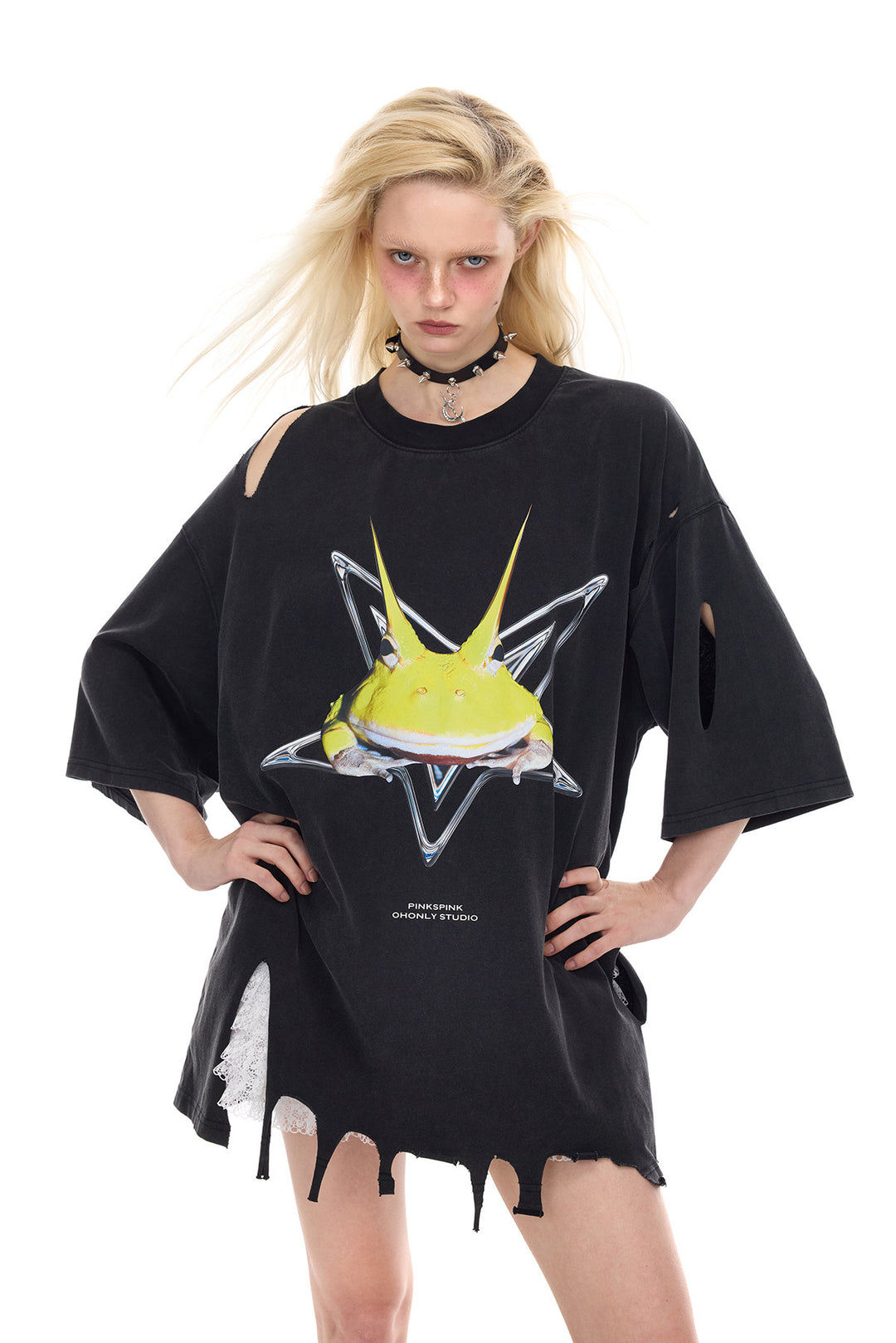 PINKSPINK HORNED FROG distressed graphic tee in black — front modeled view with hands on hips showing sleeve and hem distressing