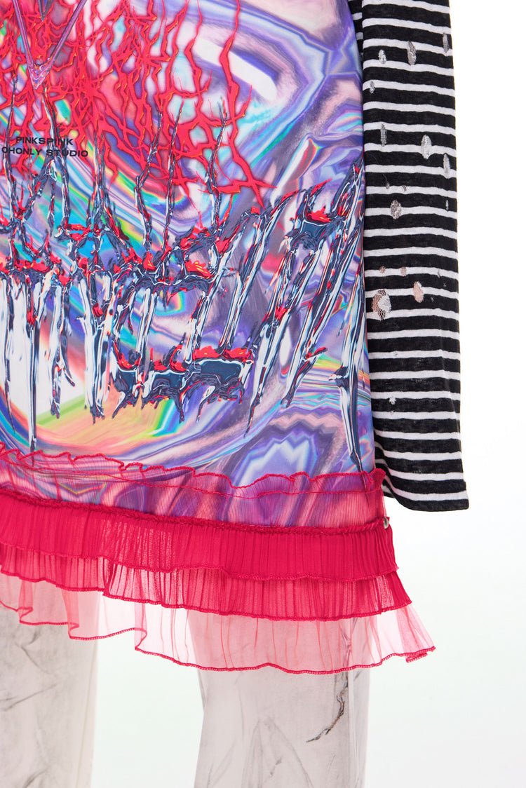 PINKSPINK HORNED FROG ruffle-trim layering apron in pink multicolor — close-up of the pink ruffled hem and printed fabric