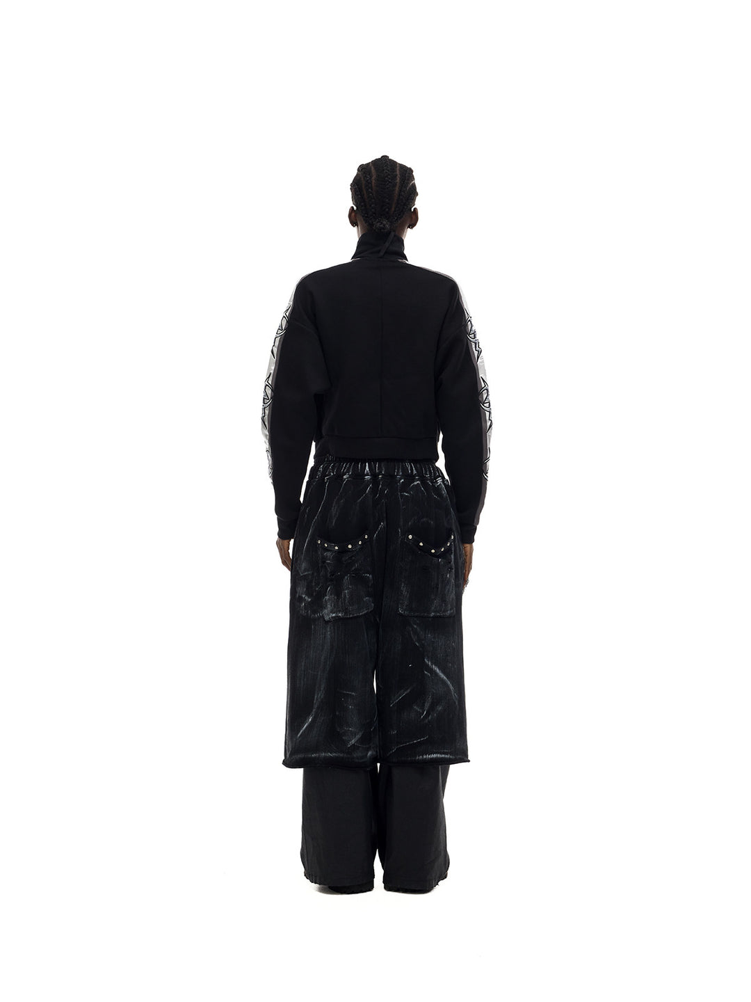 PINKSPINK MIRROR silver-panel zip jacket in black and silver — rear full-length modeled view with trousers