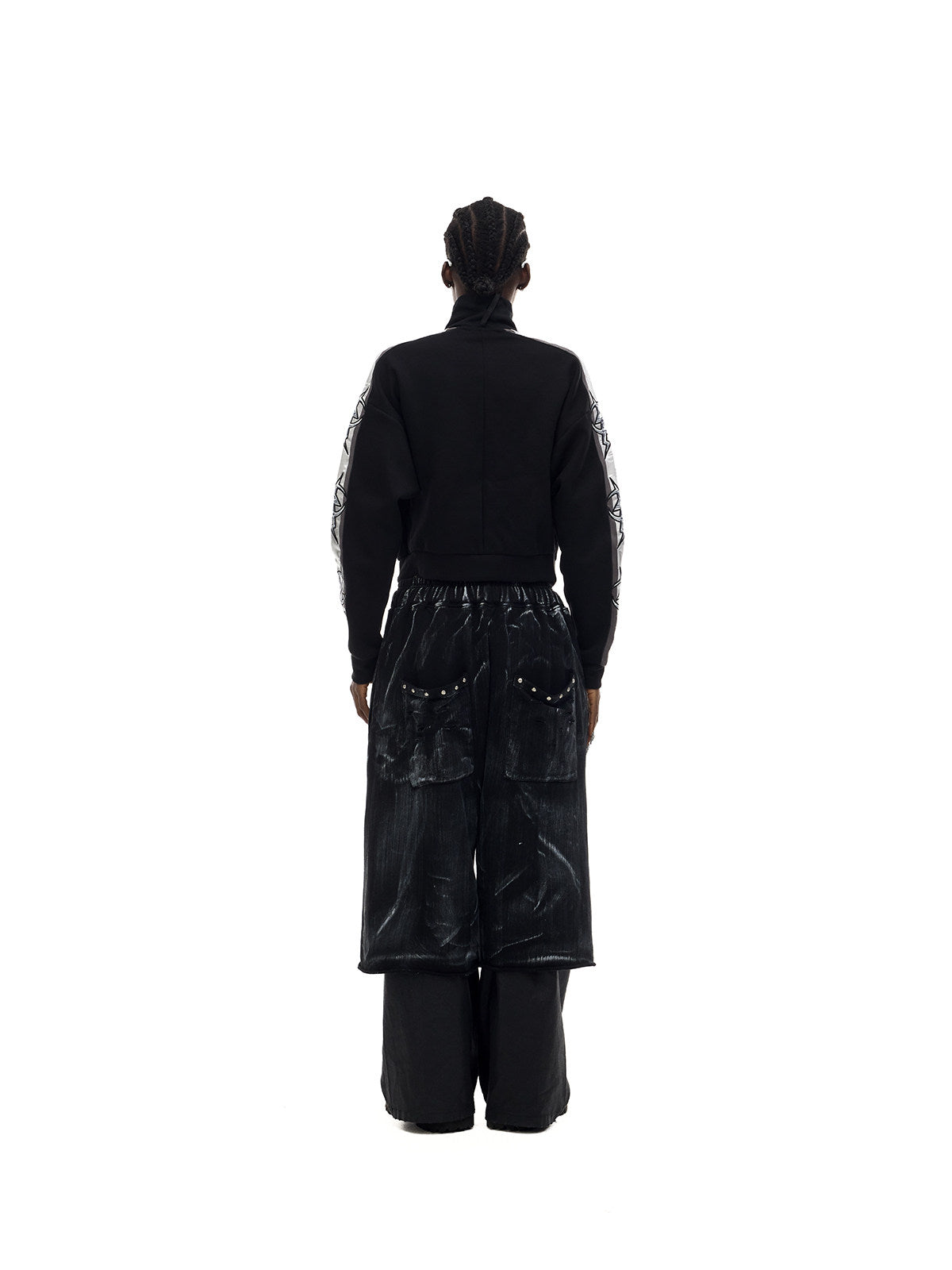 PINKSPINK MIRROR silver-panel zip jacket in black and silver — rear full-length modeled view with trousers