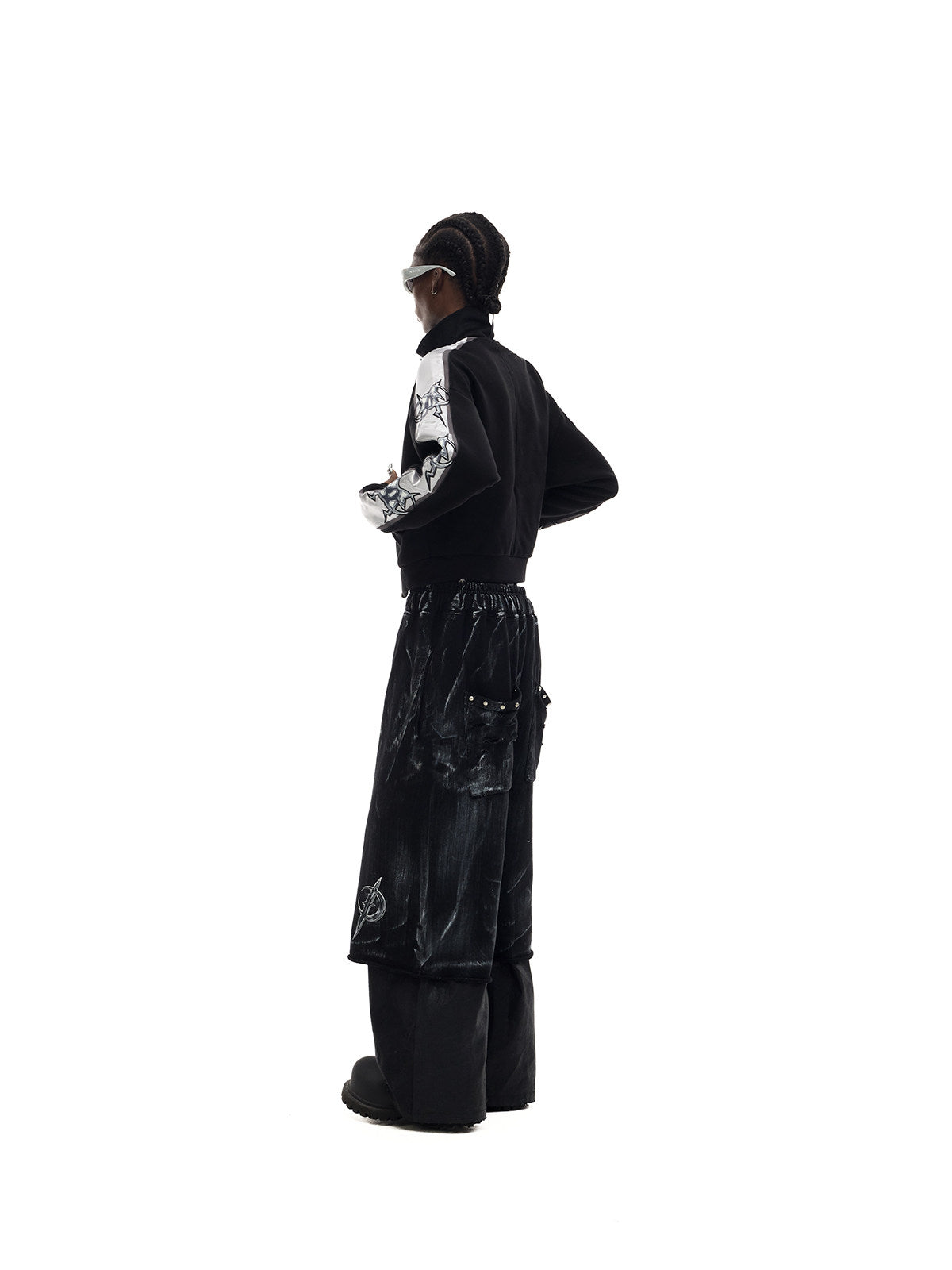 PINKSPINK MIRROR silver-panel zip jacket in black and silver — three-quarter rear modeled view showing the sleeve graphic