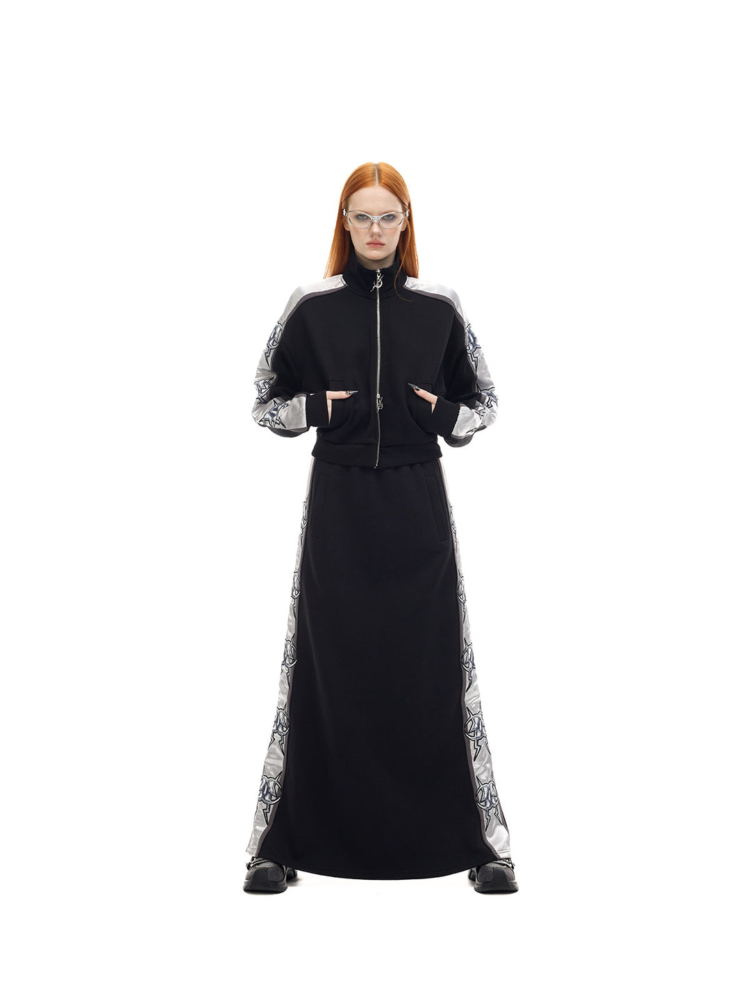 PINKSPINK MIRROR silver-panel maxi skirt in black and silver — front full-length modeled view with a straight stance